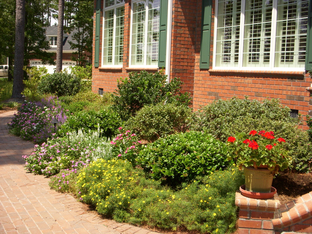 Reed,Landscape,Irrigation,Discover,Outdoor,Living,best New Bern landscape contractor,guaranteed,licensed,bonded,insured,Trent Woods,Oriental,Taberna,Greenbrier,River Bend,Carolina Colours,Fairfield Harbour,Craven County,Pamlico County,best landscaper,landscaping,irrigation system,low voltage lighting,quality landscape lighting,drains,drainage,best drainage solutions,retaining walls,patio,paver,concrete paver,brick paver,paver driveway,paver walkway,paver path,natural stone,river rock,water feature,pondless water feature,koi pond,pond,quality Vista Lighting,Belgard,Hunter,Rainbird,garden,perennial,annual,maintenance,meticulous grounds maintenance,landscape maintenance,most popular Eastern North Carolina landscape contractor,pergola,outdoor kitchen,quality,professional,professionalism,best,dedicated,integrity,drainage solutions,french drain,New Bern landscape design,Craven County landscape design,Oriental landscape contractor,finest landscape company in New Bern and Craven County and Pamlico County